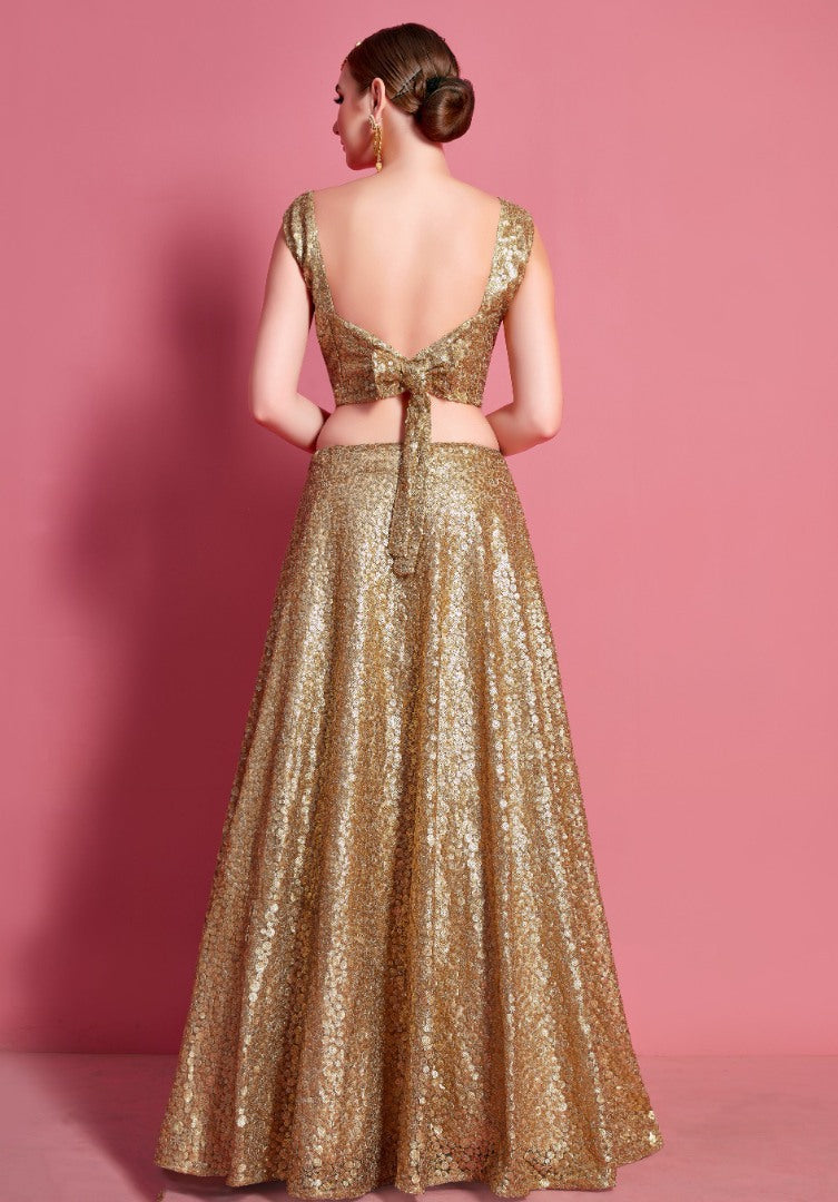 Gold soft net embroidered party wear lehenga choli