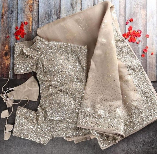 Golden georgette sequence with piping work saree