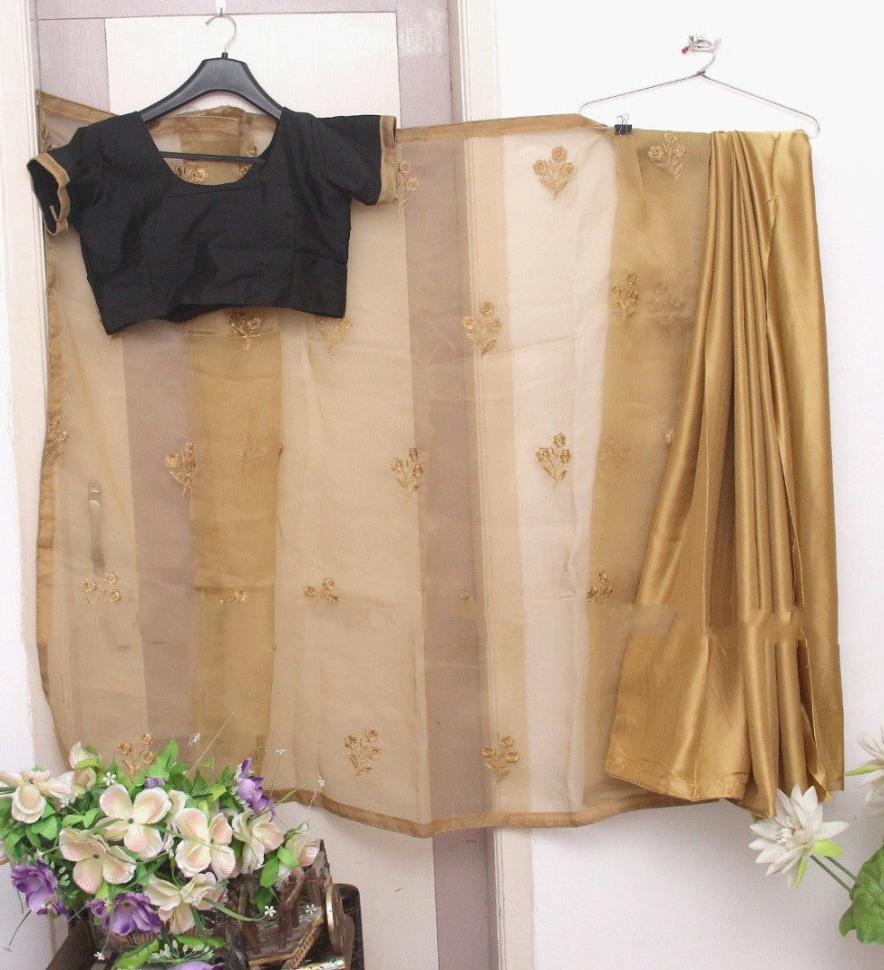 Golden heavy organza silk designer saree