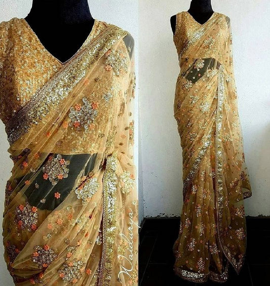 Golden mono net heavy embroidered wedding saree