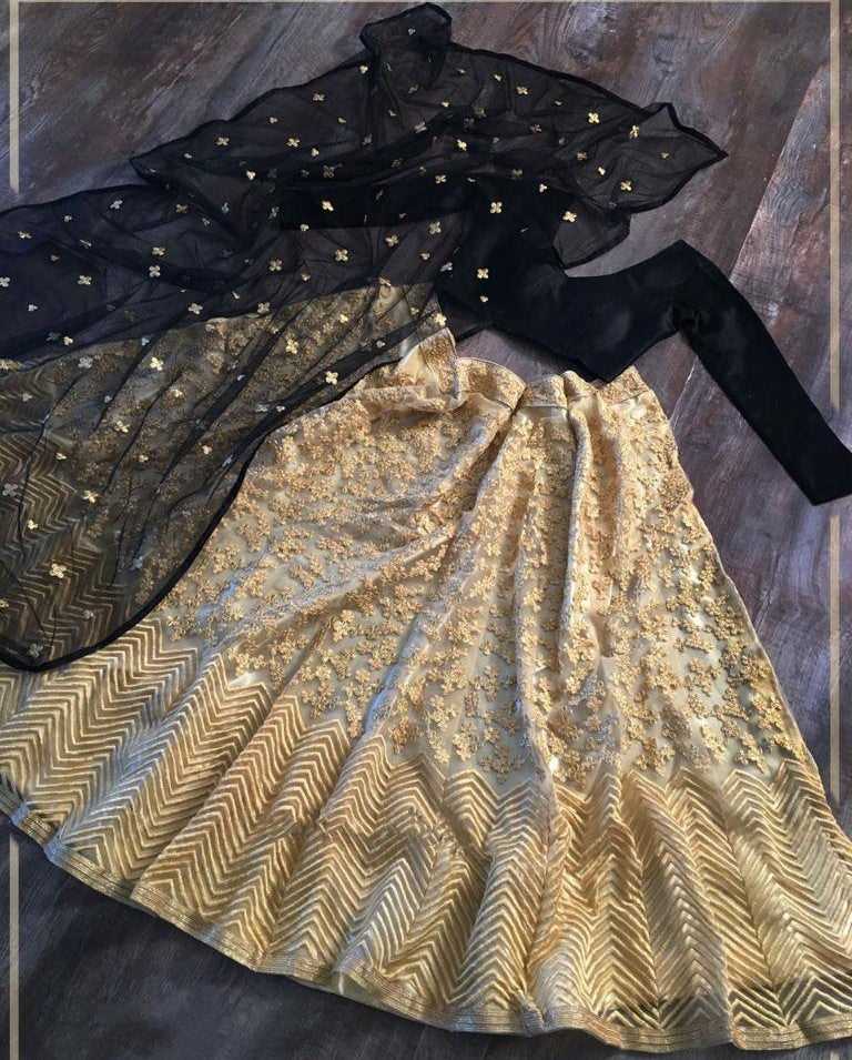 Golden net embroidered work lehenga ceremonial lehenga choli