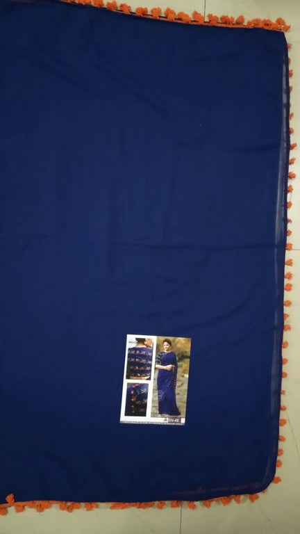 Gorgeous blue partywear saree with embroidered blouse design