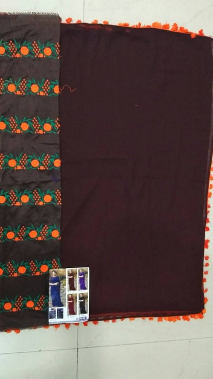 Gorgeous coffee partywear saree with embroidered blouse design