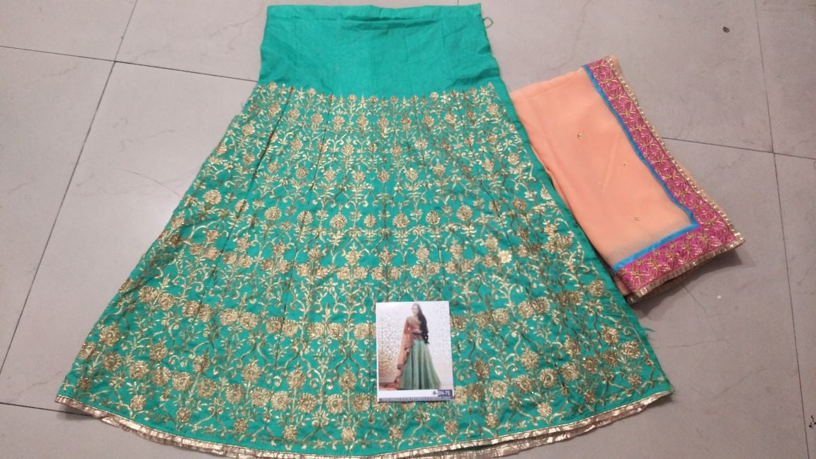 Gorgeous embroidered green bridal ceremonial lehenga
