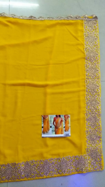 Gorgeous embroidered lace yellow ceremonial saree