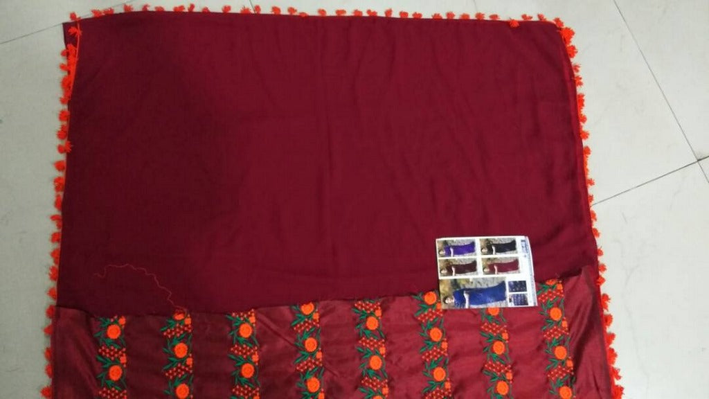 Gorgeous maroon partywear saree with embroidered blouse design