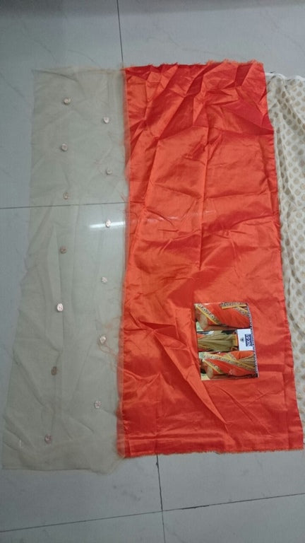 Gorgeous orange embroidered wedding saree