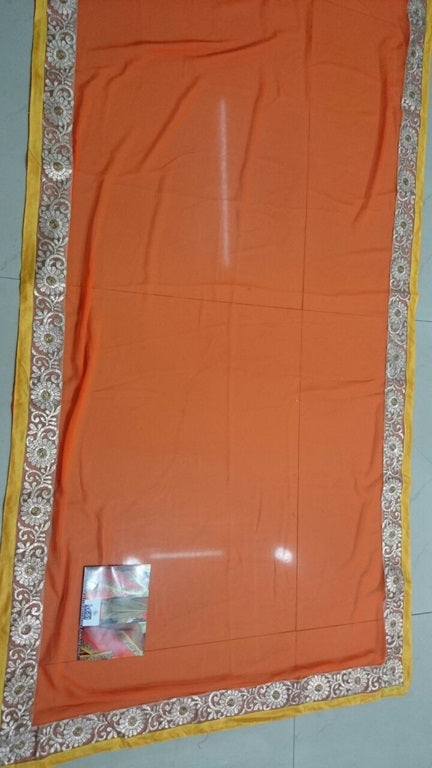 Gorgeous orange embroidered wedding saree