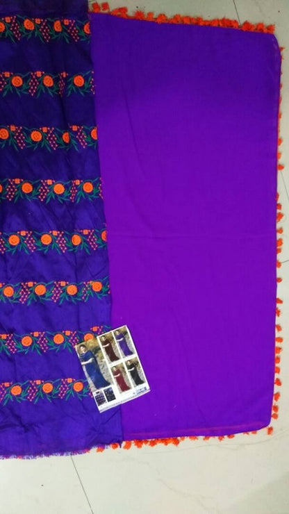 Gorgeous purple partywear saree with embroidered blouse design