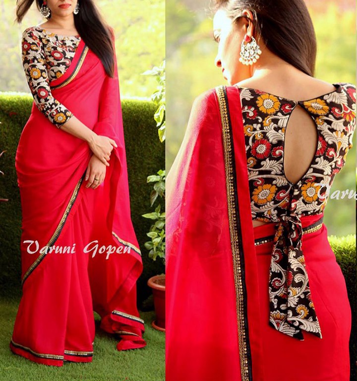 Gorgeous red partywear saree with fancy blouse