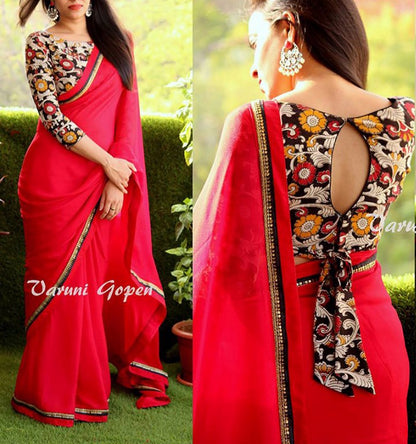 Gorgeous red partywear saree with fancy blouse