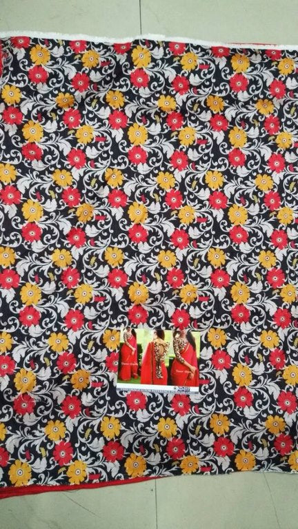 Gorgeous red partywear saree with fancy blouse