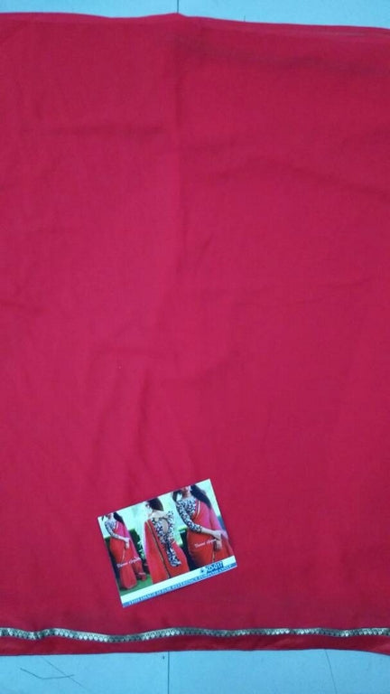 Gorgeous red partywear saree with fancy blouse