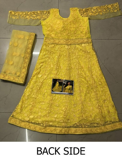 Gorgeous yellow mono net heavy embroidered ceremonial anarkali suit