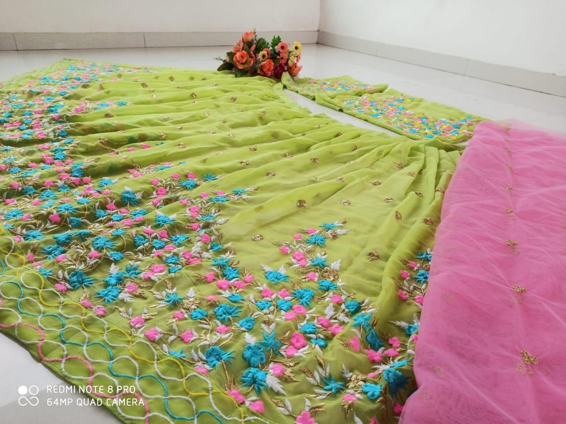 Green georgette embroidered ceremonial lehenga choli