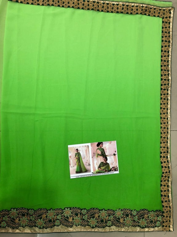 Green Georgette embroidered partywear saree with fancy blouse