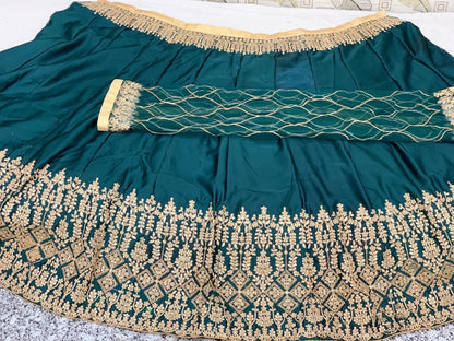 Green goldy silk heavy embroidered designer wedding lehengha