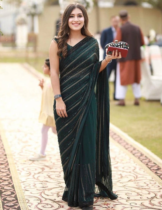 Green heavy embroidered sequence embroidery work party wear saree