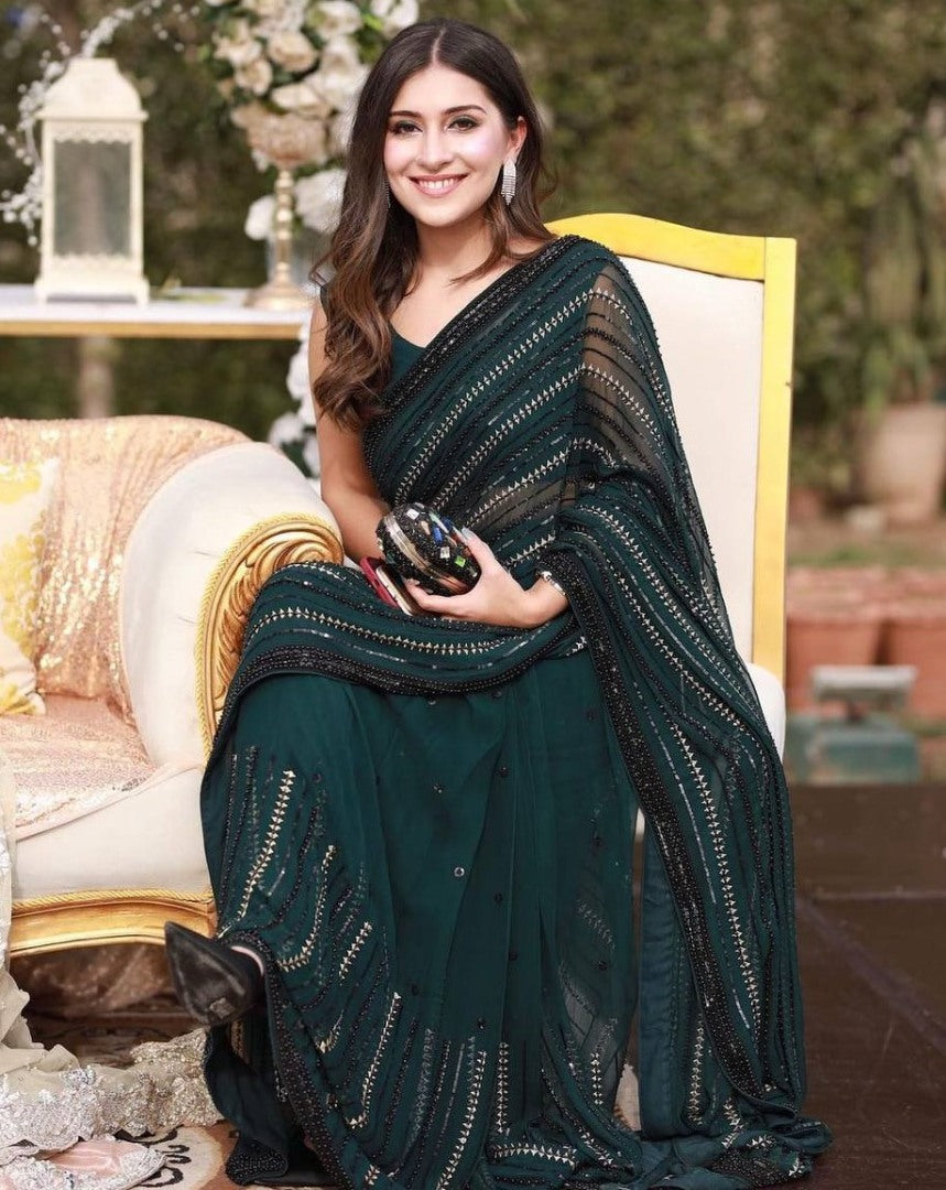Green heavy embroidered sequence embroidery work party wear saree