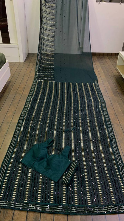 Green heavy embroidered sequence embroidery work party wear saree