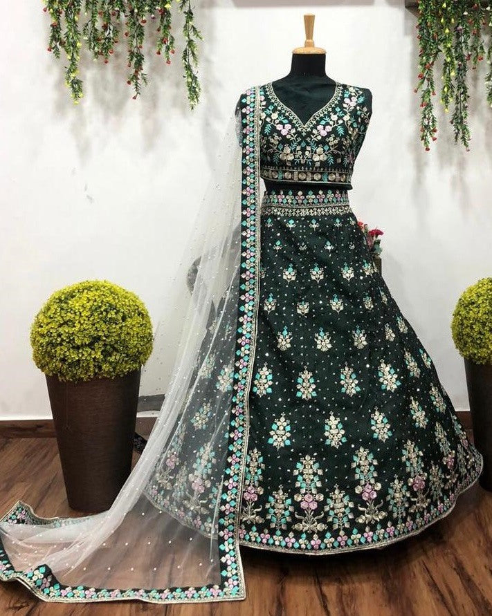 Green heavy embroidered wedding lehenga choli