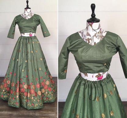 Green kitkat silk embroidered stone work lehenga choli