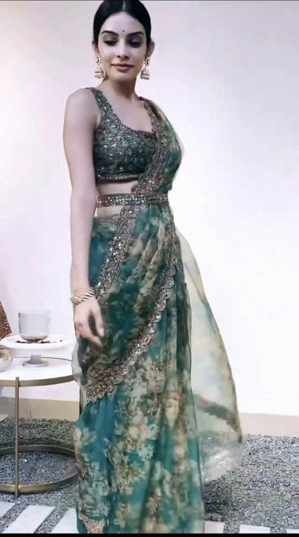 Green organza embroidered and sequence work saree