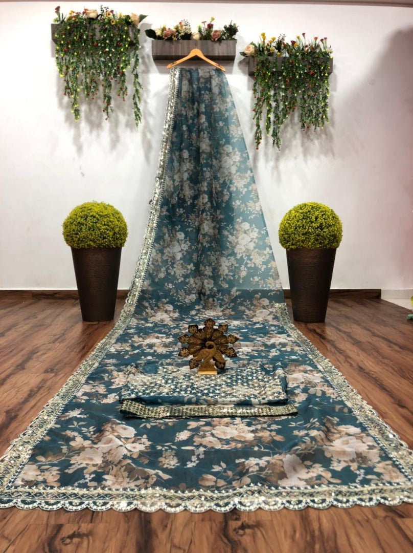 Green organza embroidered and sequence work saree
