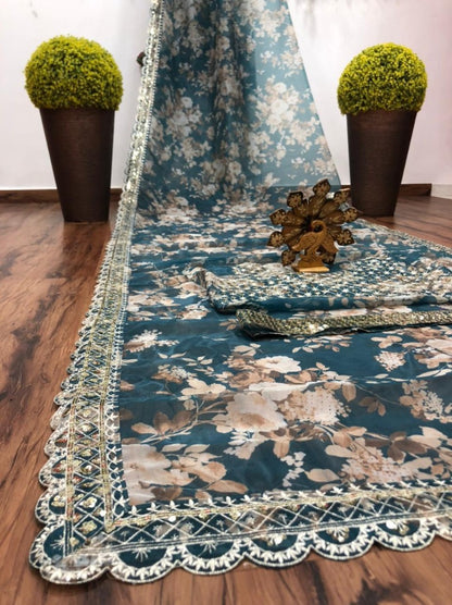 Green organza embroidered and sequence work saree