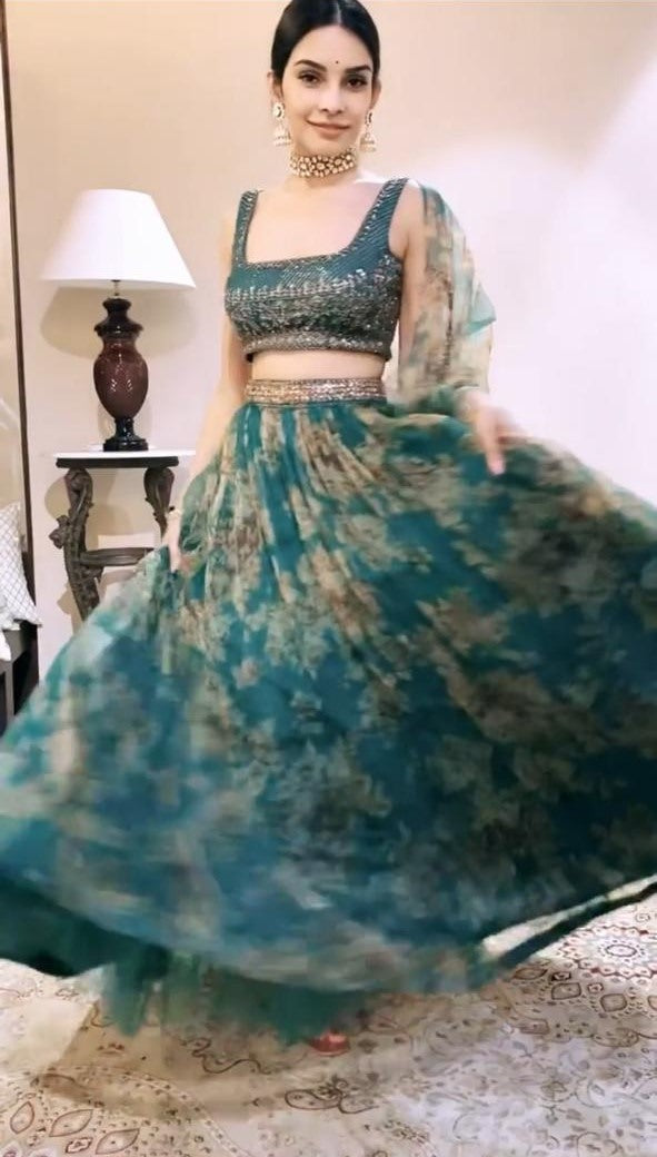 Green organza embroidered with sequence work lehenga choli