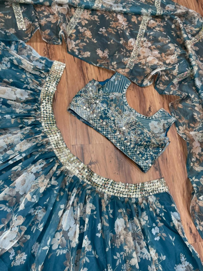 Green organza embroidered with sequence work lehenga choli