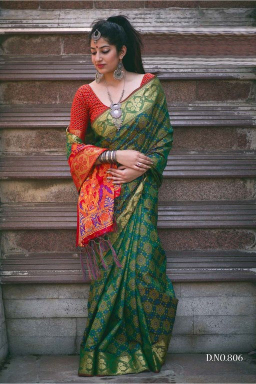 green patola silk saree