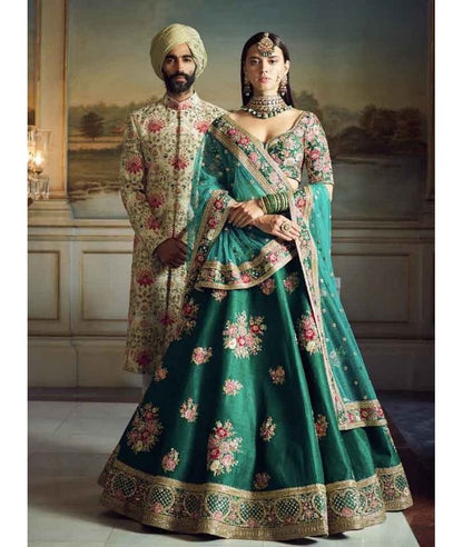 Green phantom silk embroidered bridal lehenga