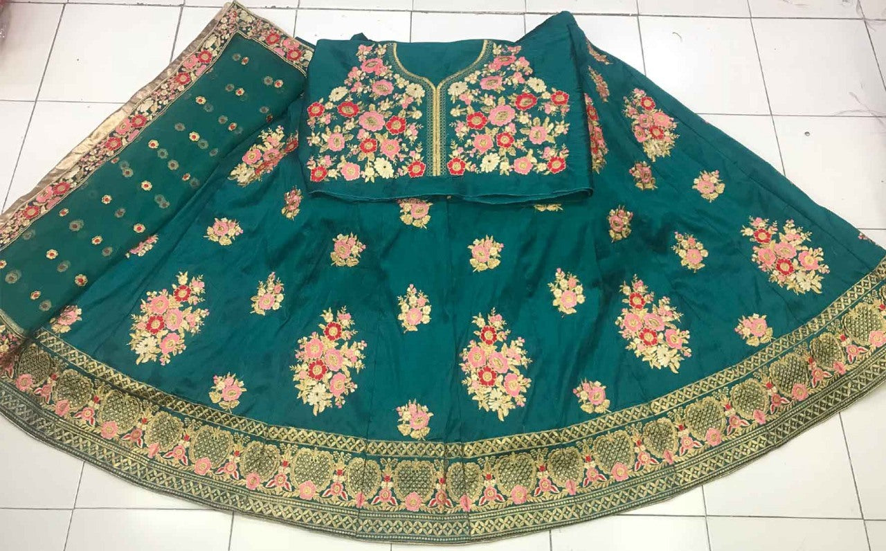 Green phantom silk embroidered bridal lehenga