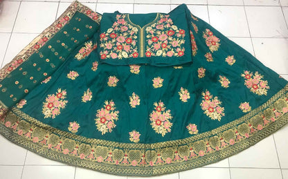 Green phantom silk embroidered bridal lehenga