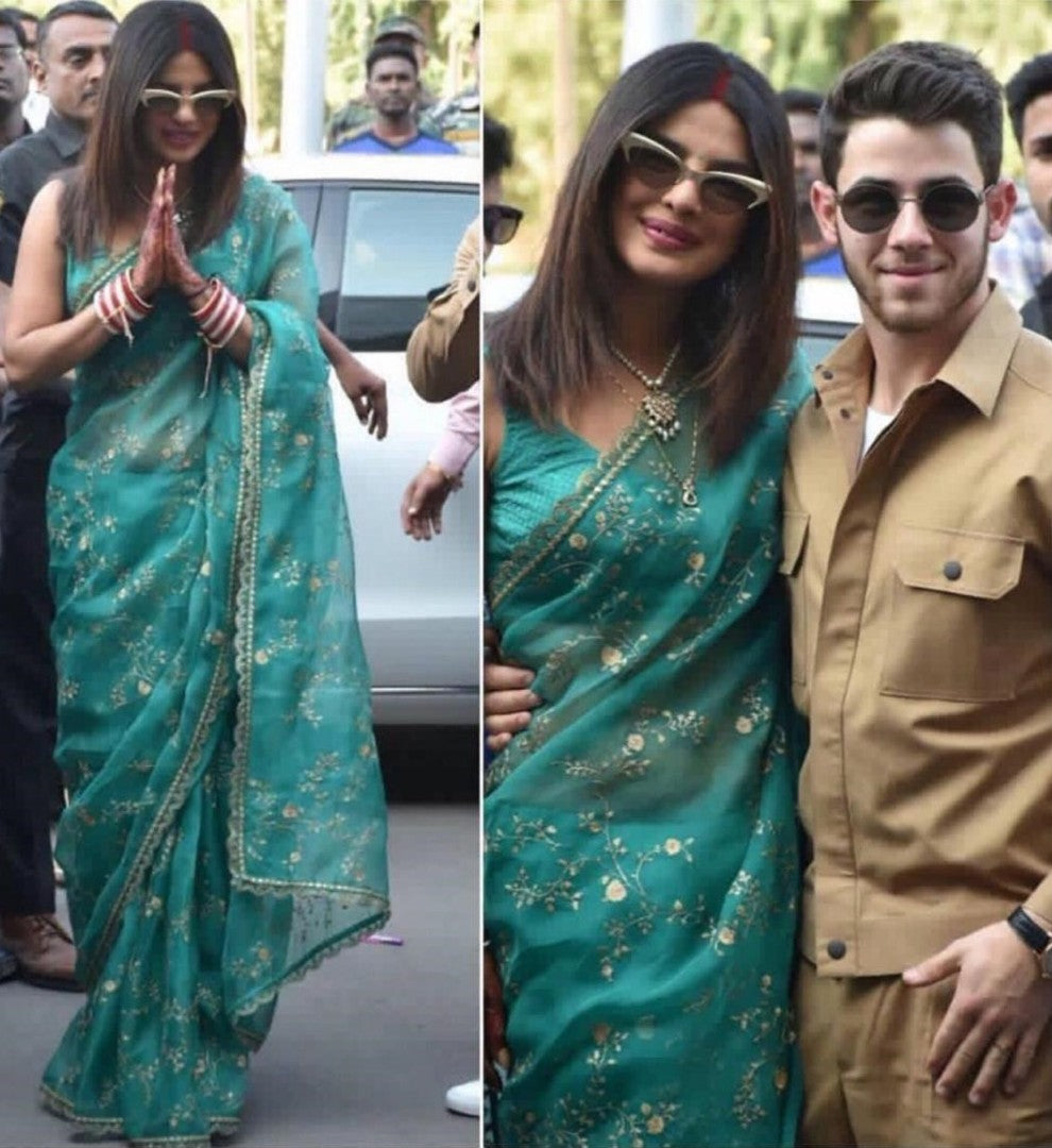 Green tissue net embroidered bollywood saree