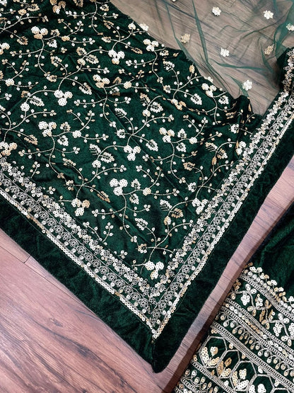 Green velvet heavy embroidered anarkali gown for wedding function