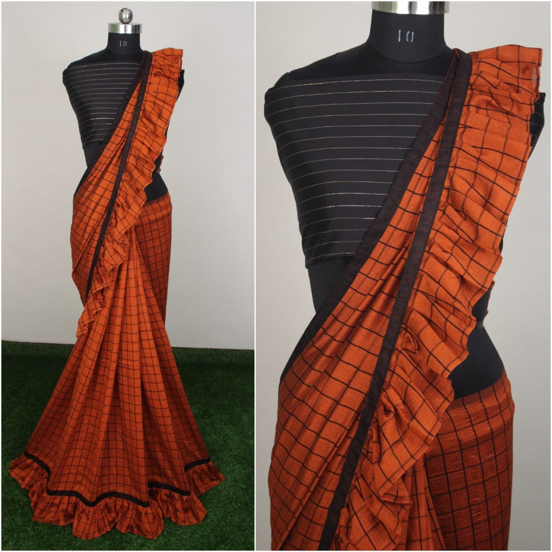 Green vichitra silk chex print saree with ruffle border