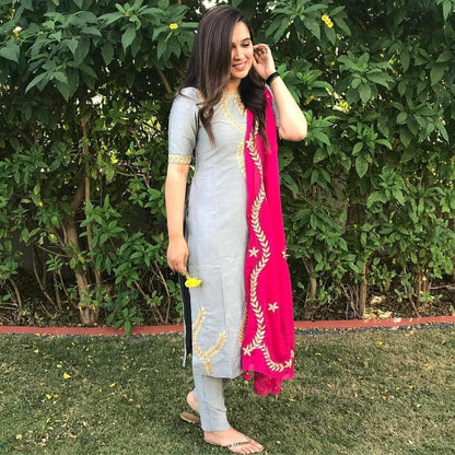 Grey cotton salwar suit with pink dupatta