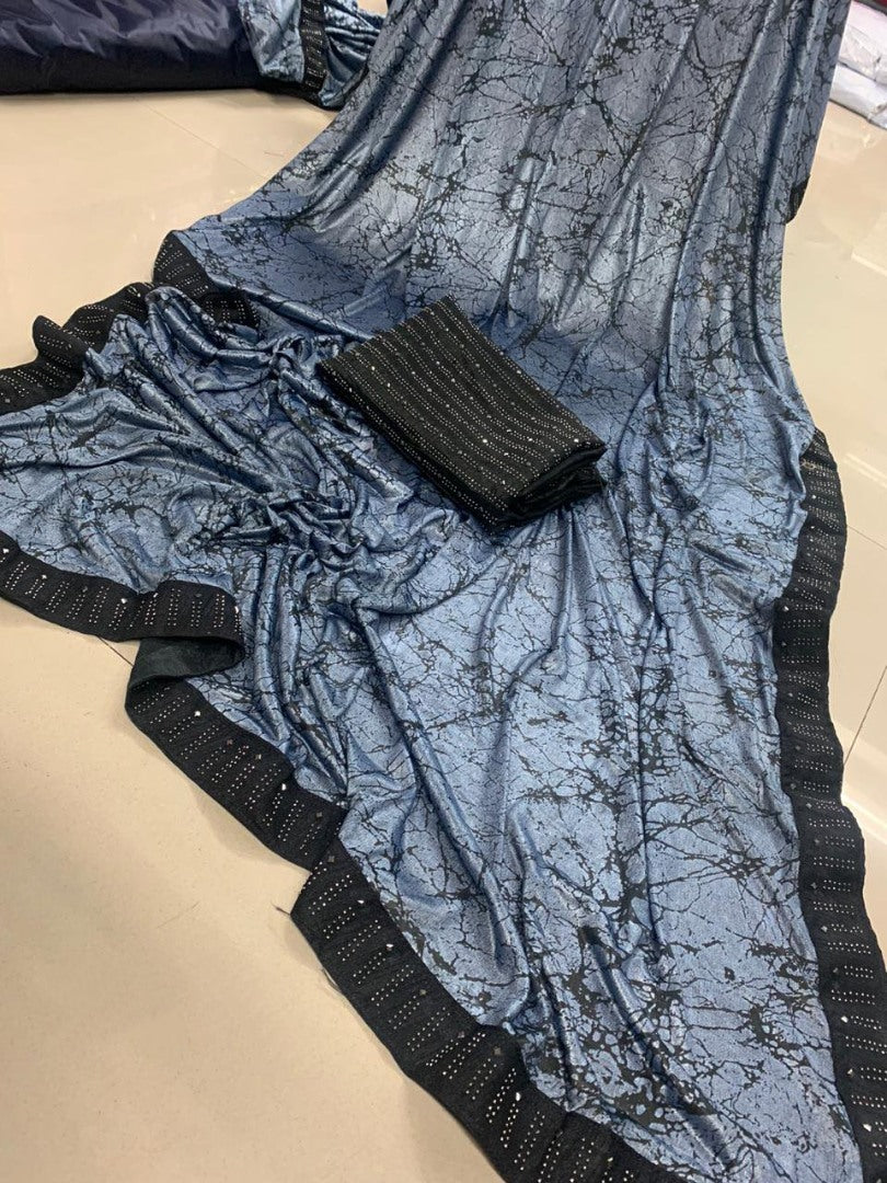 Grey heavy lycra stone work border partywear saree