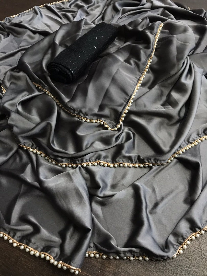 Grey japan satin party wear saree with pearl lace with sequence work blouse