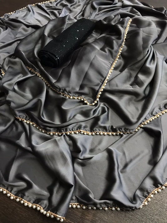 Grey japan satin party wear saree with pearl lace with sequence work blouse