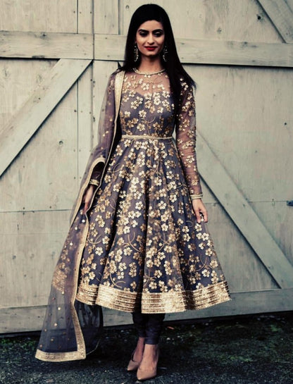 Grey net beautiful embroidered anarkali suit