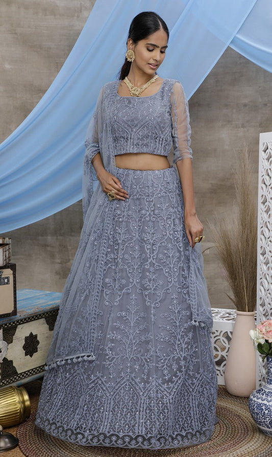 Grey net heavy embroidered stone pasting wedding lehenga choli