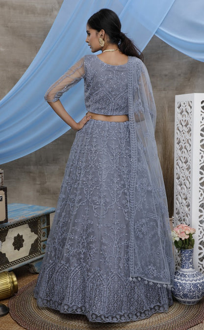 Grey net heavy embroidered stone pasting wedding lehenga choli