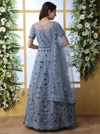Grey net heavy thread embroidered wedding long anarkali gown