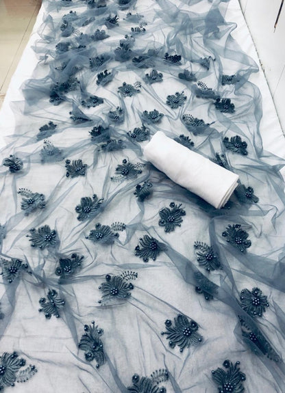 Grey net moti and embroidery work saree