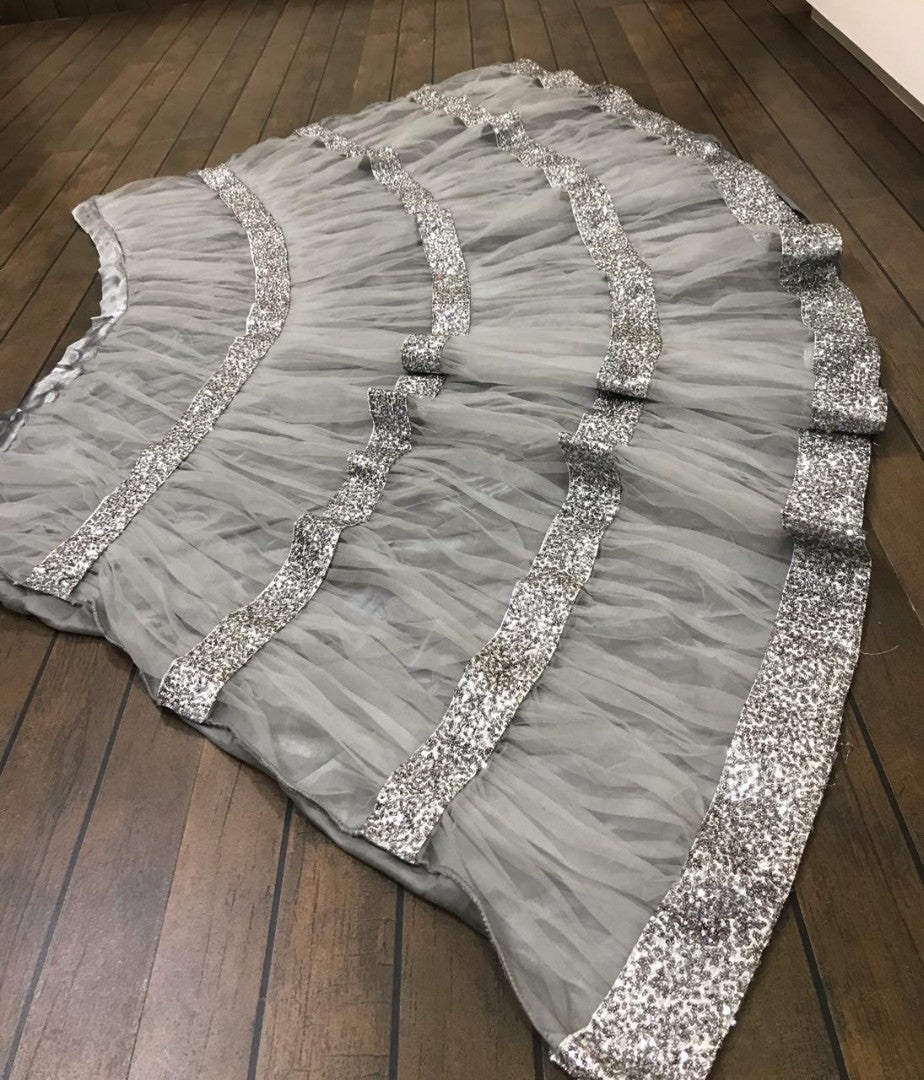 Grey net sequence worked ceremonial lehenga choli