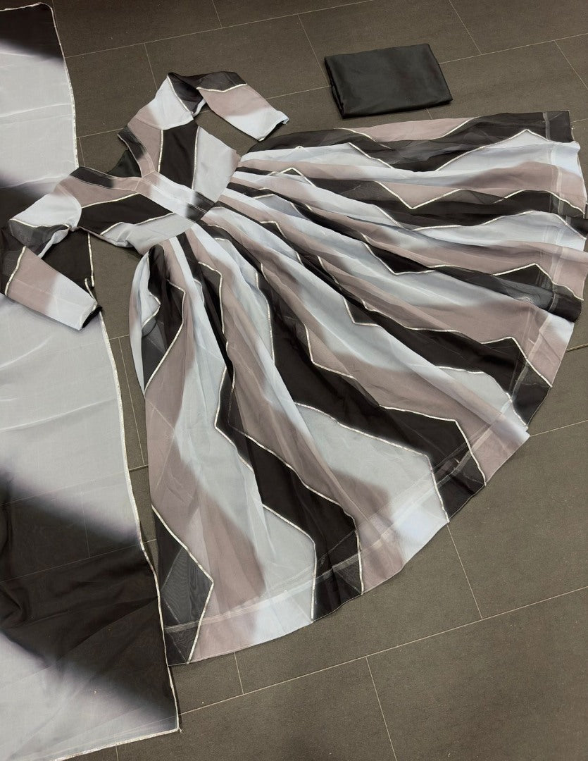 Grey organza silk print and ribbon work anarkali suit