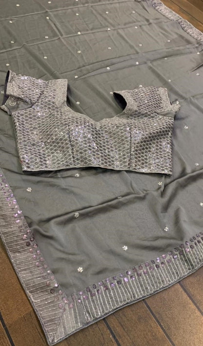 Grey rangoli silk sequence with stone work saree